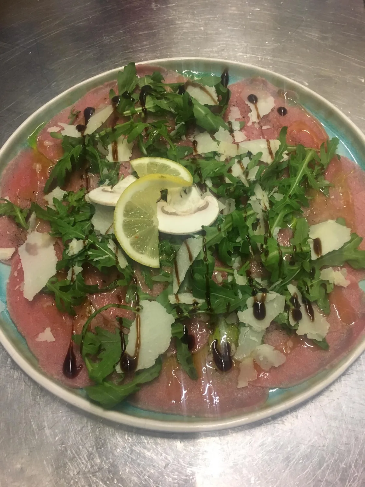 Carpaccio, roquette, parmesan et citron